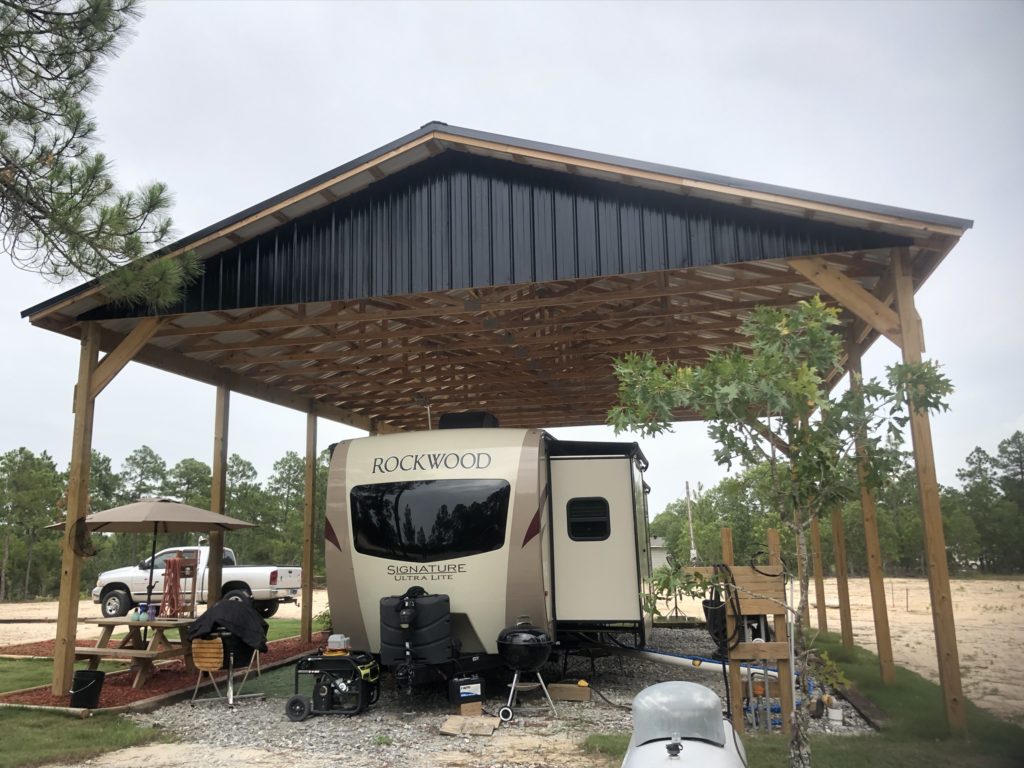 finished large carport with RV under it